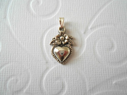 Pendentif argenté motif - ,